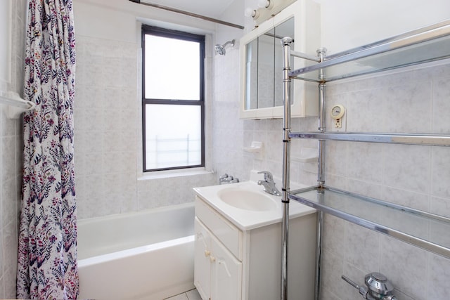 100-25 Queens Blvd Unit 2Aa, New York City, NY 11375 - bathroom with vanity, healthy amount of natural light, shower / bath combo, and tile walls
