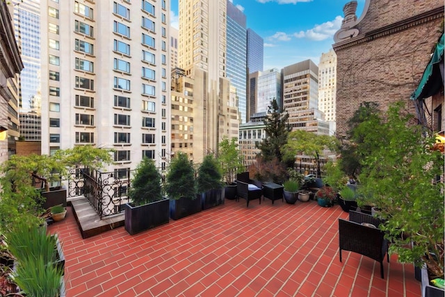 480 Park Ave Unit 15E, New York City, NY 10022 - wooden deck featuring a city view