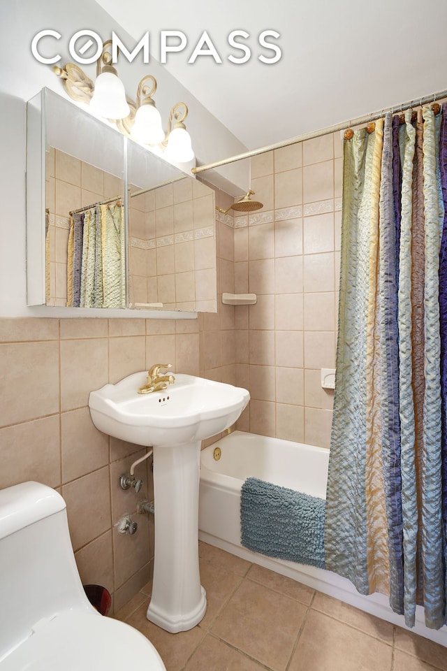 5700 Arlington Ave Unit 16T, New York City, NY 10471 - bathroom with shower / tub combo, tile patterned floors, toilet, and tile walls