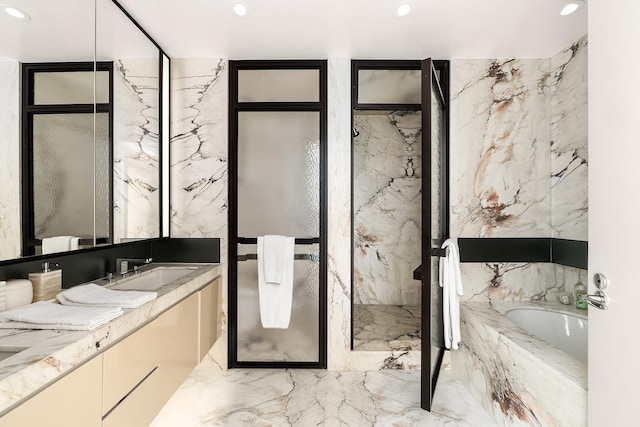 11 Beach St Unit 5B, New York City, NY 10013 - full bathroom featuring vanity, a bath, recessed lighting, and a marble finish shower
