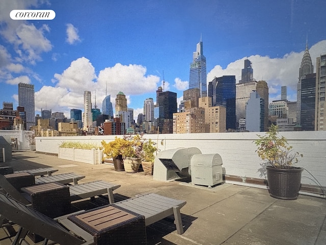 155 E 34th St Unit 8S, New York City, NY 10016 - view of patio / terrace featuring a skyline view