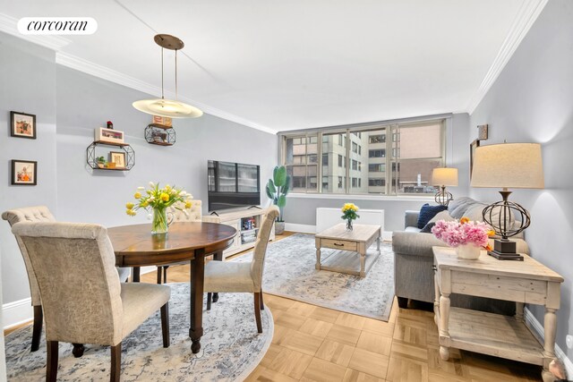 200 E 58th St Unit 5E, New York City, NY 10022 - dining space featuring crown molding and baseboards