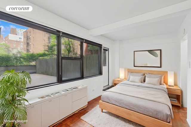 345 E 69th St Unit 2B, New York City, NY 10021 - bedroom featuring beam ceiling