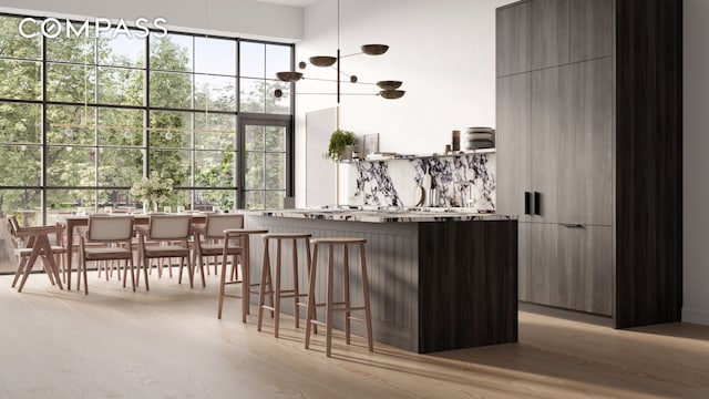 17 Douglass St, New York City, NY 11231 - bar featuring light wood-type flooring, a towering ceiling, and backsplash