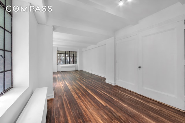 320 E 42nd St Unit 418, New York City, NY 10017 - unfurnished room featuring wood-type flooring and radiator