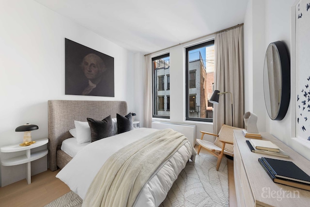 210 Lafayette St Unit 5A, New York City, NY 10012 - bedroom with wood finished floors