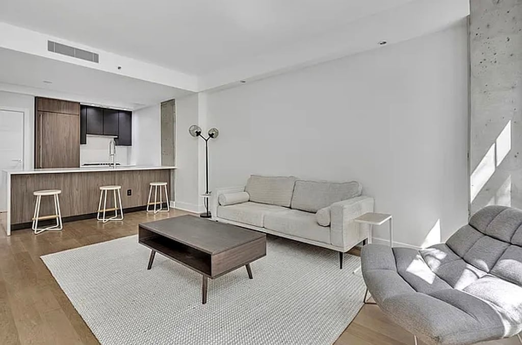 253 E 7th St Unit 2A, New York City, NY 10009 - living room featuring wood finished floors