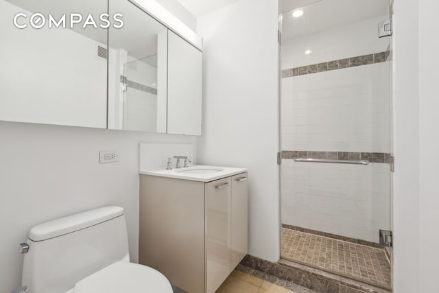415 Main St Unit 4G, New York City, NY 10044 - full bathroom with toilet, a shower stall, vanity, tile patterned floors, and recessed lighting