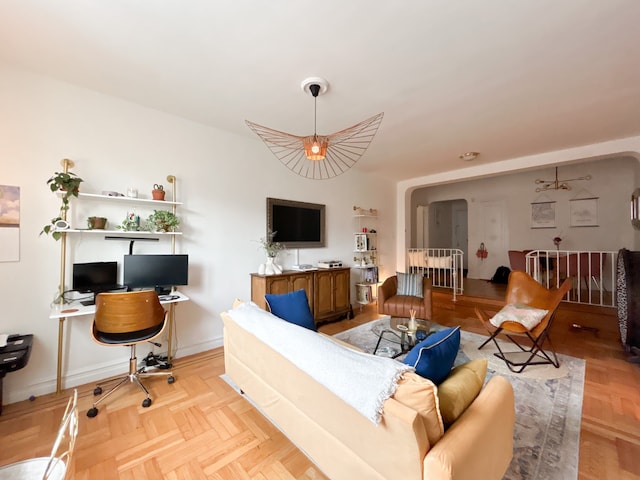 100 Bennett Ave Unit 4B, New York City, NY 10033 - living room featuring a desk and arched walkways