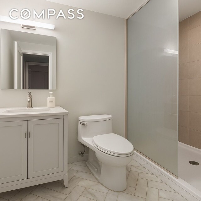 28 W 38th St Unit 6E, New York City, NY 10018 - full bath with toilet, vanity, and a walk in shower