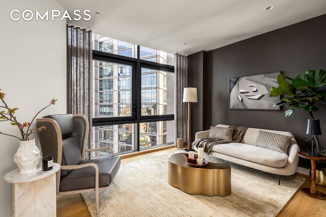 33 Park Row Unit Ph1, New York City, NY 10038 - living area with expansive windows and wood finished floors