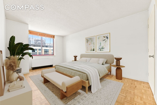 4-74 48th Ave Unit Ph2B, New York City, NY 11109 - bedroom with radiator, a textured ceiling, and baseboards