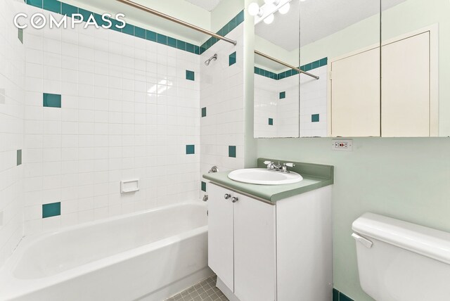 4-74 48th Ave Unit Ph2B, New York City, NY 11109 - bathroom featuring vanity, toilet, tub / shower combination, and tile patterned floors