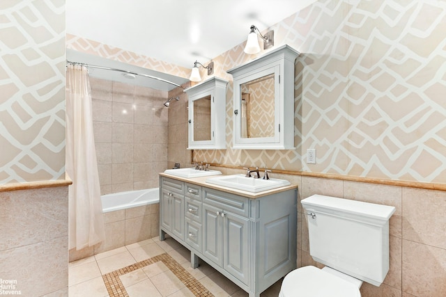 18 Morningside Ave Unit 3, New York City, NY 10026 - full bathroom featuring tile patterned flooring, tiled shower / bath, toilet, double vanity, and wallpapered walls