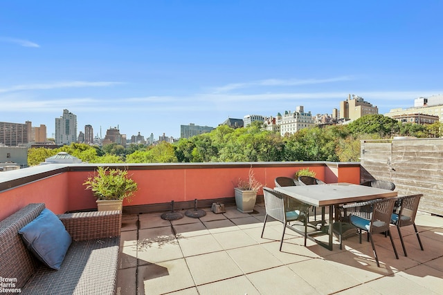 18 Morningside Ave Unit 3, New York City, NY 10026 - view of patio with a view of skyline and outdoor dining space