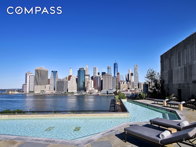 90 Furman St Unit N107, New York City, NY 11201 - community pool featuring a skyline view and a water view