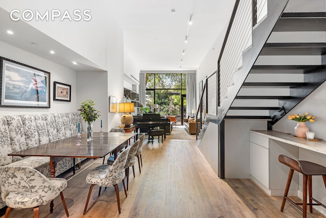 90 Furman St Unit N107, New York City, NY 11201 - dining room featuring stairway and light wood finished floors