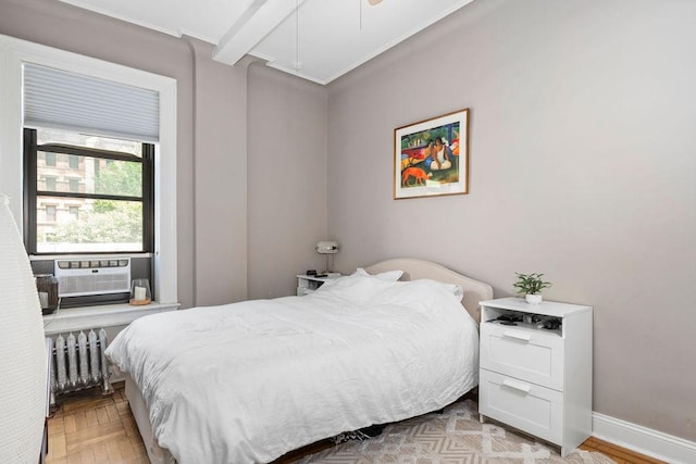 255 W 108th St Unit 2F, New York City, NY 10025 - bedroom featuring radiator, cooling unit, and a ceiling fan