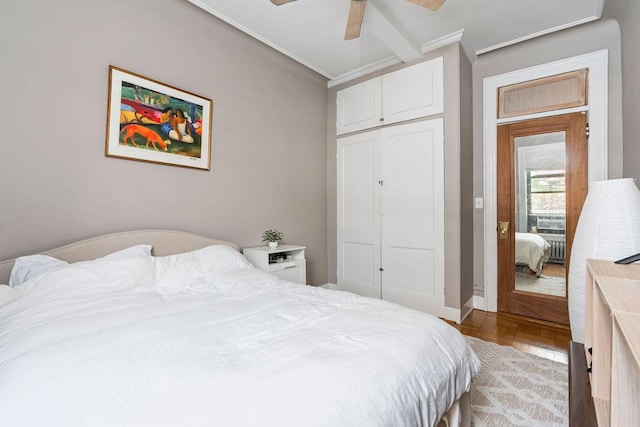 255 W 108th St Unit 2F, New York City, NY 10025 - bedroom featuring ornamental molding, a closet, and a ceiling fan