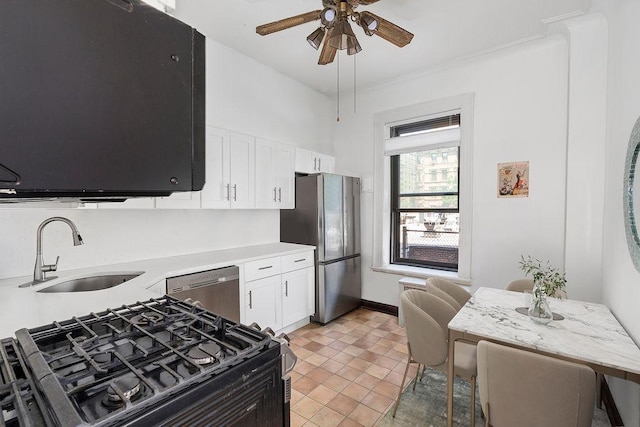255 W 108th St Unit 2F, New York City, NY 10025 - kitchen featuring a sink, appliances with stainless steel finishes, ceiling fan, light countertops, and white cabinets