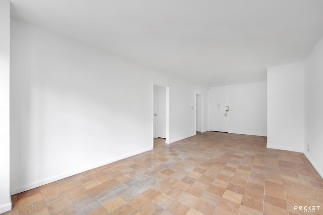 345 E 80th St Unit 5-L, New York City, NY 10075 - spare room featuring baseboards