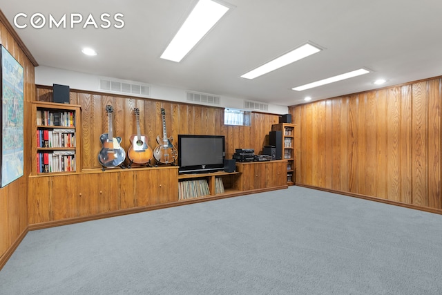 492 Westminster Rd, New York City, NY 11218 - carpeted living area featuring wood walls and recessed lighting