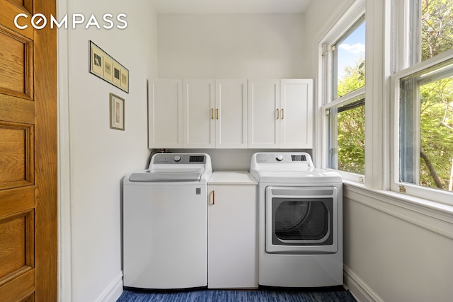 492 Westminster Rd, New York City, NY 11218 - washroom with washing machine and clothes dryer, cabinet space, and baseboards