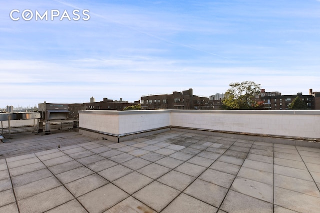 460 W 236th St Unit 65, New York City, NY 10463 - view of patio featuring a view of city