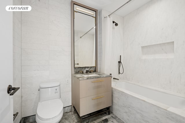 91 Leonard St Unit 7H, New York City, NY 10013 - full bathroom with vanity, toilet, a combined bath / shower with marble appearance, and tile walls