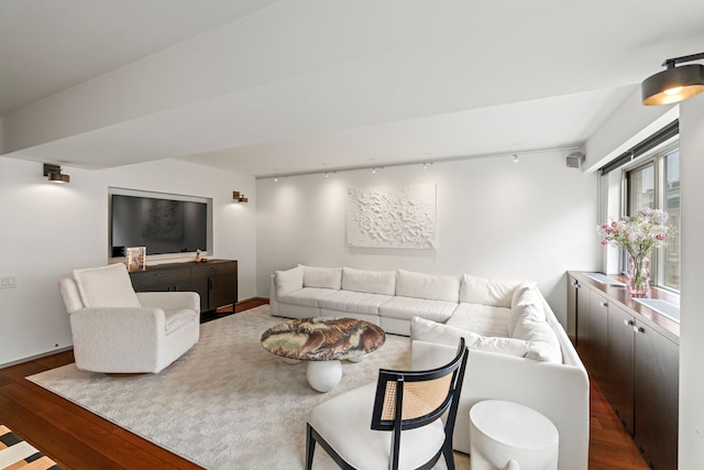 40 E 78th St Unit 7-H, New York City, NY 10075 - living area featuring rail lighting, wood finished floors, and baseboards