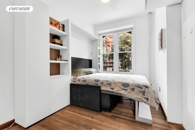 198 E 7th St Unit 1, New York City, NY 10009 - bedroom with wood finished floors and a ceiling fan