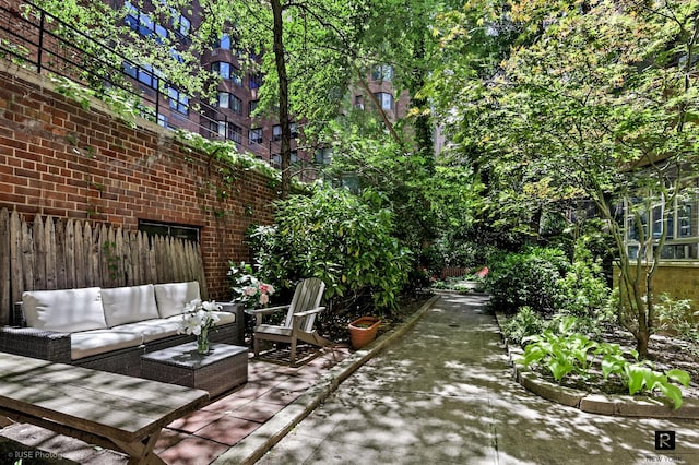 440 E 56th St Unit 1-G, New York City, NY 10022 - view of patio featuring outdoor lounge area