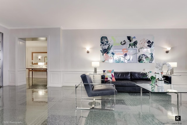 440 E 56th St Unit 1-G, New York City, NY 10022 - living area featuring crown molding, granite floors, a decorative wall, and wainscoting