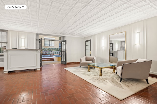 304 W 75th St Unit 9H, New York City, NY 10023 - building lobby with a decorative wall and an ornate ceiling