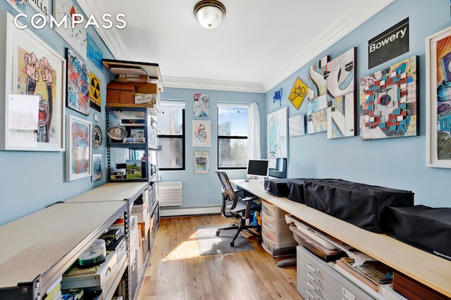 36 Russell St Unit 22, New York City, NY 11222 - home office featuring crown molding, a baseboard heating unit, and light wood-type flooring
