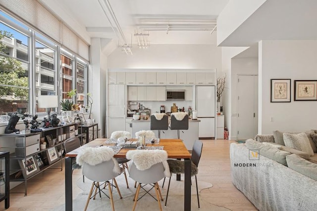 27-28 Thomson Ave Unit 135, New York City, NY 11101 - dining space featuring light wood-style flooring
