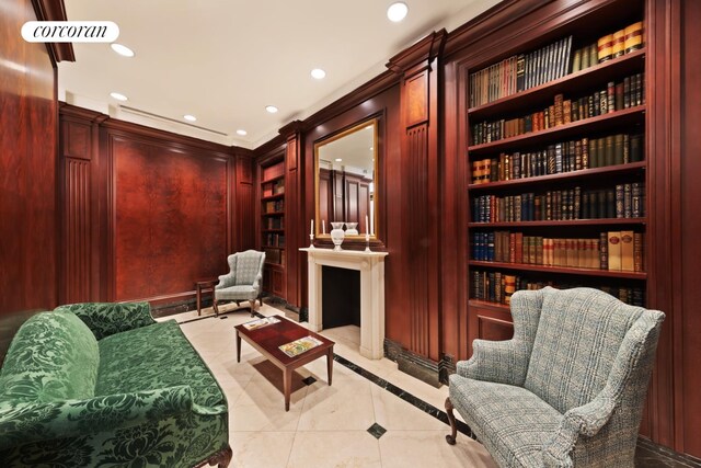 351 E 51st St Unit Ph7A, New York City, NY 10022 - living area featuring built in shelves, light tile patterned floors, and recessed lighting