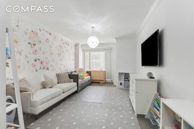 201 E 80th St Unit 16E, New York City, NY 10075 - living room featuring crown molding and a chandelier