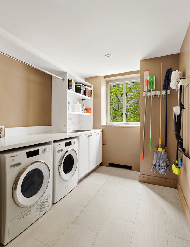 200 E 66th St Unit E307, New York City, NY 10065 - laundry room with separate washer and dryer and cabinet space