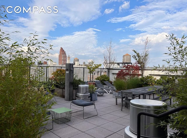 201 W 74th St Unit 8G, New York City, NY 10023 - view of patio / terrace featuring outdoor dining area