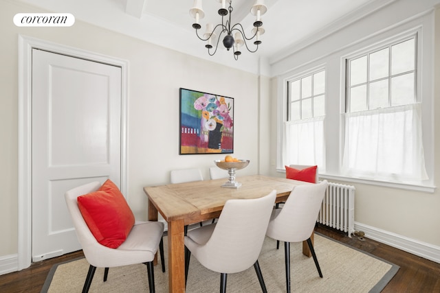 125 E 74th St Unit 2B, New York City, NY 10021 - dining area with a chandelier, radiator, dark wood-style flooring, and baseboards