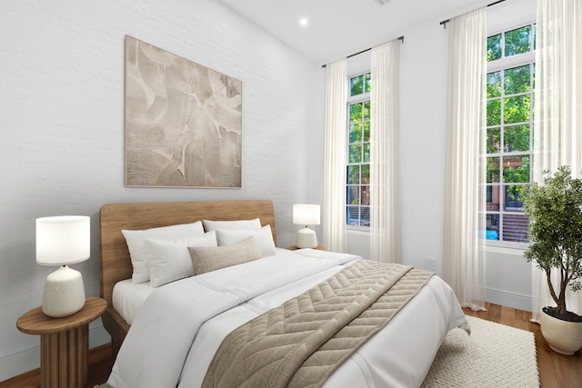 129 W 131st St Unit 1A, New York City, NY 10027 - bedroom with wood finished floors, baseboards, and recessed lighting