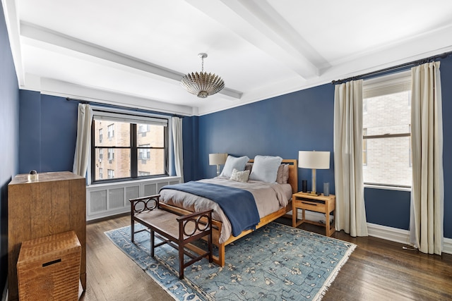 45 E 85th St Unit 7E, New York City, NY 10028 - bedroom with beamed ceiling, multiple windows, wood finished floors, and baseboards