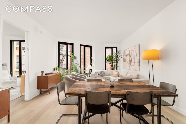 856 Washington Ave Unit 5A, New York City, NY 11238 - dining area featuring light wood-type flooring and baseboards