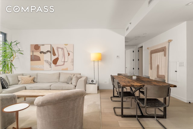 856 Washington Ave Unit 5A, New York City, NY 11238 - living area featuring light wood-style flooring and baseboards