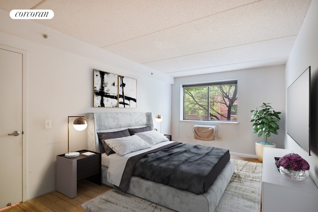 333 E 119th St Unit 1A, New York City, NY 10035 - bedroom with wood finished floors