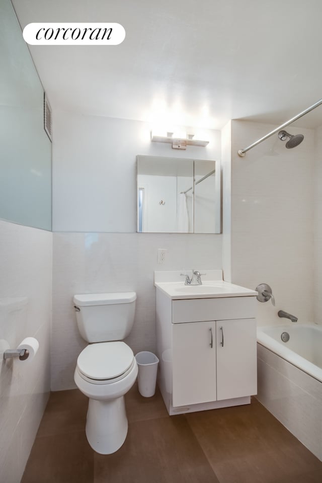 333 E 119th St Unit 1A, New York City, NY 10035 - full bath with vanity, toilet, and tiled shower / bath