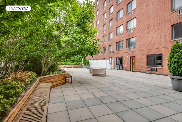 333 E 119th St Unit 1A, New York City, NY 10035 - view of community with a patio