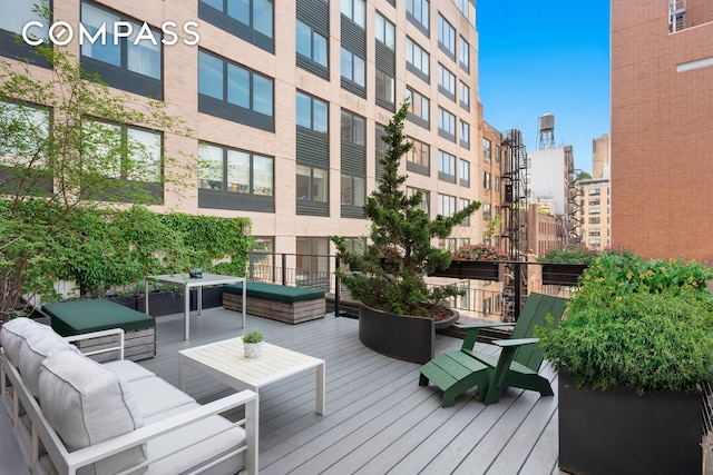 120 W 20th St Ph, Ph, New York City, NY 10011 - wooden deck featuring outdoor lounge area