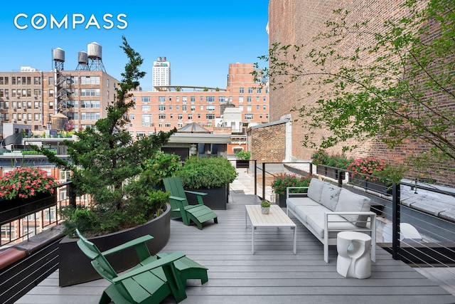 120 W 20th St Ph, Ph, New York City, NY 10011 - wooden terrace featuring outdoor lounge area and a view of city